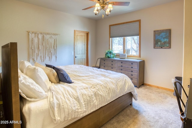 702 Flag Hollow Rd, Pinetop-Lakeside, AZ 85929 - bedroom with light carpet, baseboards, and ceiling fan