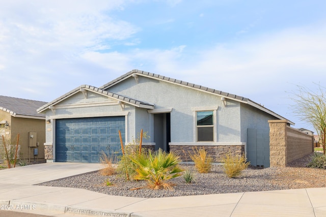 view of front of property with a garage, stone siding, driveway, and stucco siding