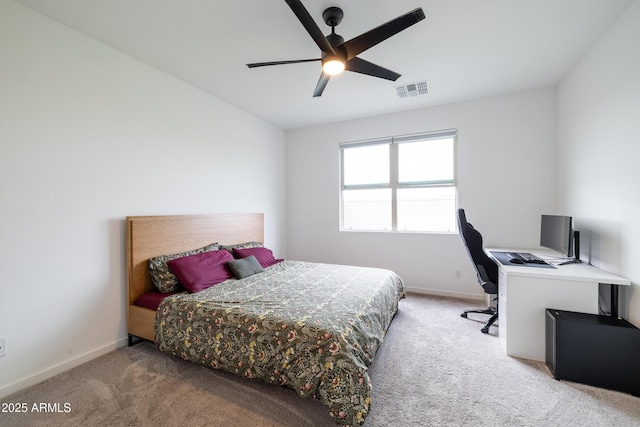 carpeted bedroom with baseboards, visible vents, and ceiling fan