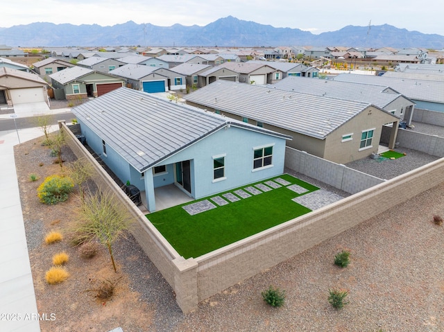 birds eye view of property featuring a residential view and a mountain view