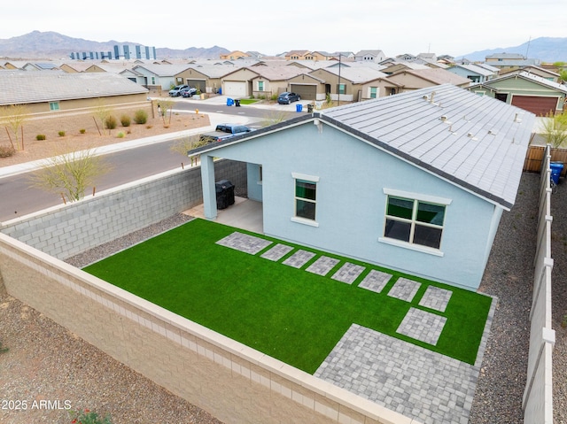 birds eye view of property with a residential view and a mountain view