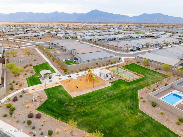 birds eye view of property with a residential view and a mountain view