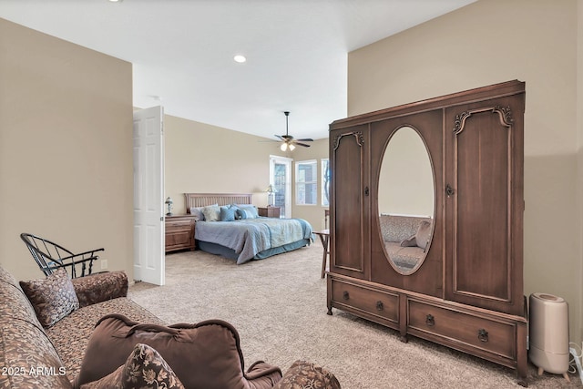 bedroom with light carpet and ceiling fan