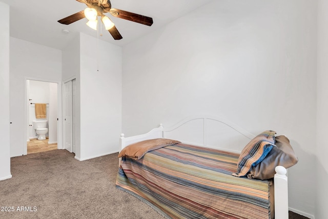 bedroom featuring carpet, a closet, baseboards, and a ceiling fan