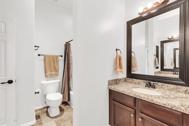 full bathroom featuring toilet, vanity, baseboards, stone finish flooring, and shower / bathtub combination with curtain