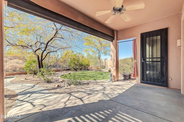 view of patio / terrace featuring a fenced backyard and ceiling fan