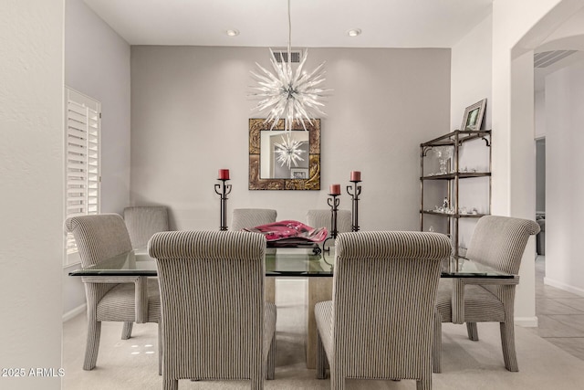 18021 N 53rd St, Scottsdale, AZ 85254 - dining room featuring a chandelier, arched walkways, recessed lighting, and baseboards