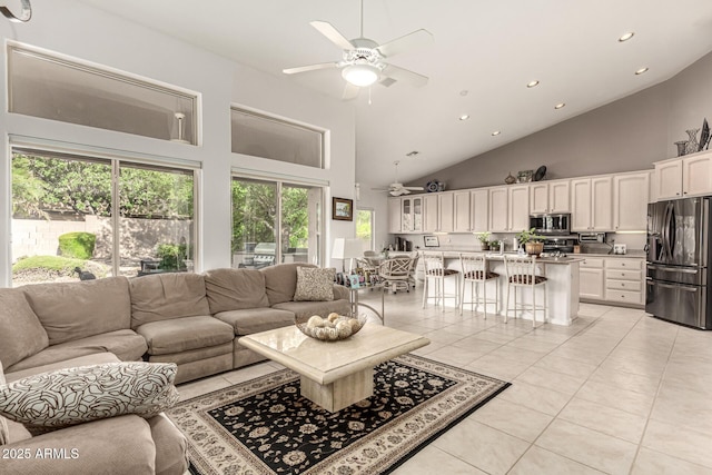 18021 N 53rd St, Scottsdale, AZ 85254 - living room featuring high vaulted ceiling, a ceiling fan, light tile patterned flooring, and recessed lighting