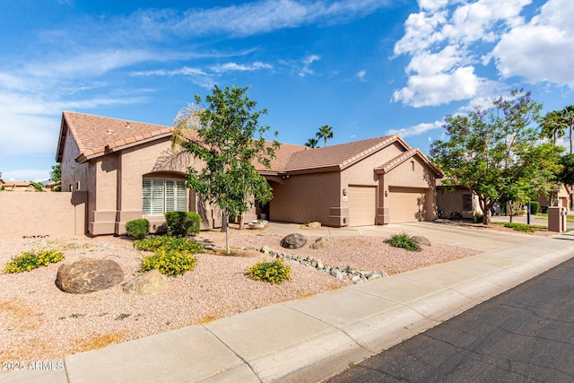 18021 N 53rd St, Scottsdale, AZ 85254 - ranch-style home with a garage, stucco siding, and a tile roof
