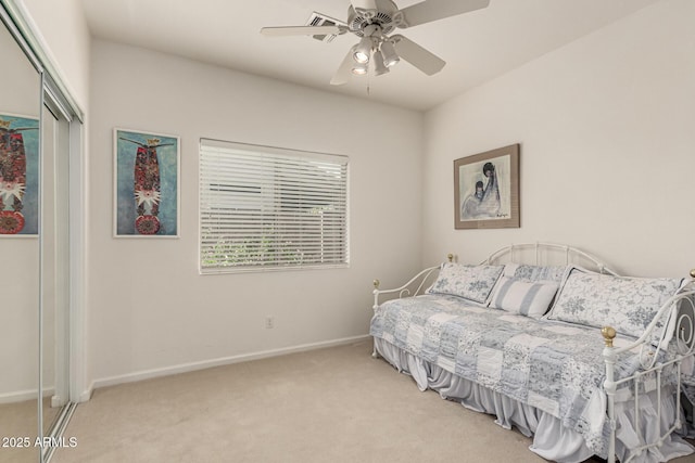 18021 N 53rd St, Scottsdale, AZ 85254 - bedroom featuring light colored carpet, baseboards, a closet, and a ceiling fan