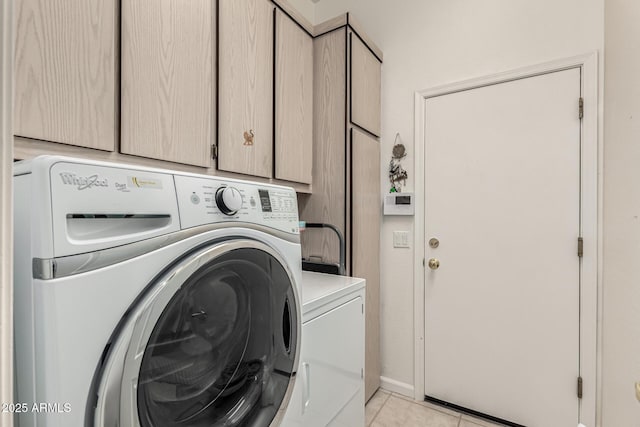 18021 N 53rd St, Scottsdale, AZ 85254 - clothes washing area with cabinet space, washing machine and clothes dryer, and light tile patterned flooring