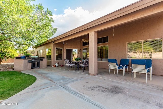18021 N 53rd St, Scottsdale, AZ 85254 - view of patio featuring an outdoor kitchen, a grill, and ceiling fan