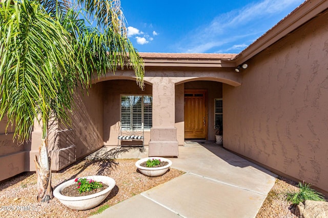 18021 N 53rd St, Scottsdale, AZ 85254 - entrance to property featuring stucco siding and a patio