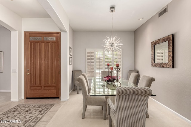 18021 N 53rd St, Scottsdale, AZ 85254 - dining room with arched walkways, a chandelier, and baseboards