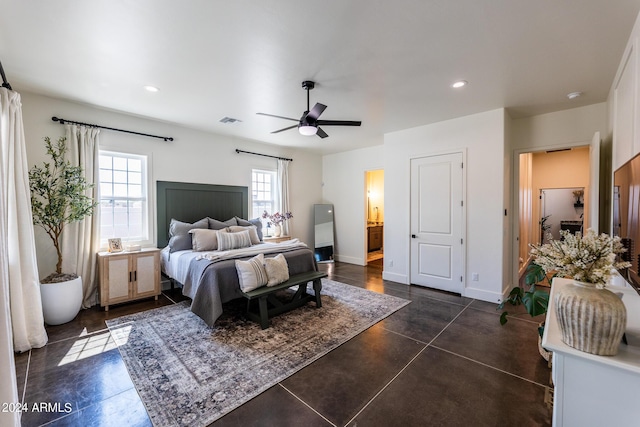 bedroom with connected bathroom and ceiling fan