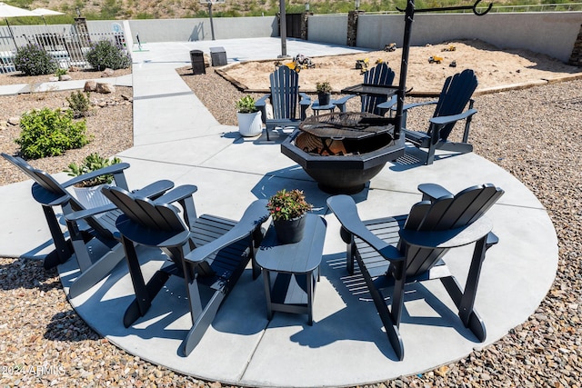 view of patio featuring an outdoor fire pit