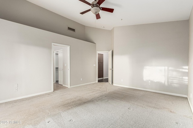 3152 N 83rd Pl, Scottsdale, AZ 85251 - unfurnished bedroom with a walk in closet, carpet floors, a ceiling fan, high vaulted ceiling, and a closet