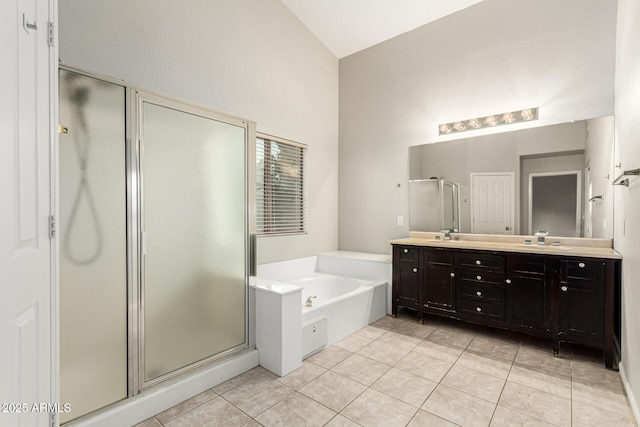 3152 N 83rd Pl, Scottsdale, AZ 85251 - bathroom with a shower stall, tile patterned flooring, double vanity, a garden tub, and high vaulted ceiling