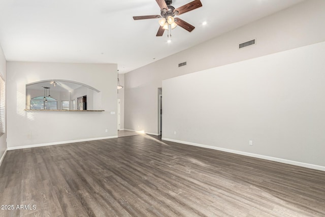 3152 N 83rd Pl, Scottsdale, AZ 85251 - unfurnished living room with a ceiling fan, wood finished floors, recessed lighting, and arched walkways