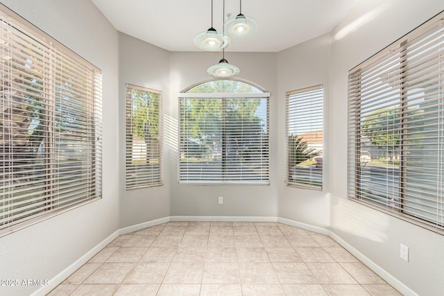 3152 N 83rd Pl, Scottsdale, AZ 85251 - unfurnished dining area featuring tile patterned floors and baseboards