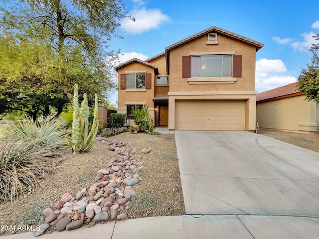 view of front property with a garage