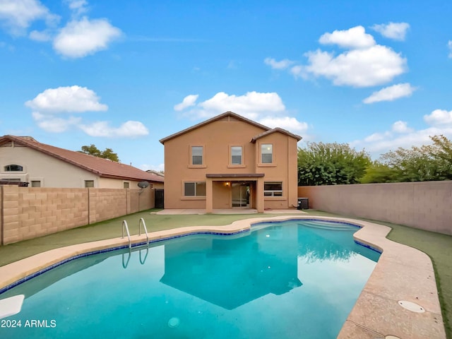 view of swimming pool featuring a patio area