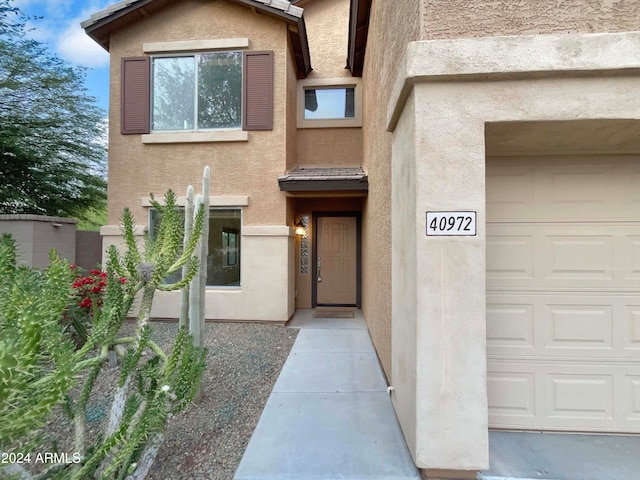 property entrance with a garage