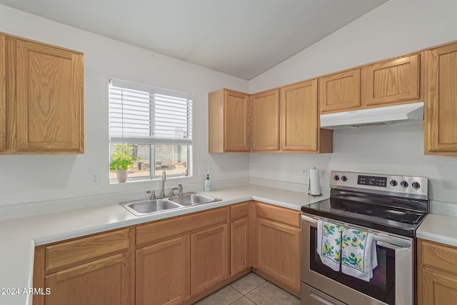 kitchen with stainless steel electric stove, sink, vaulted ceiling, and light tile patterned flooring