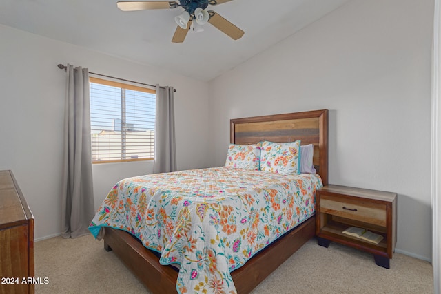 carpeted bedroom with lofted ceiling and ceiling fan