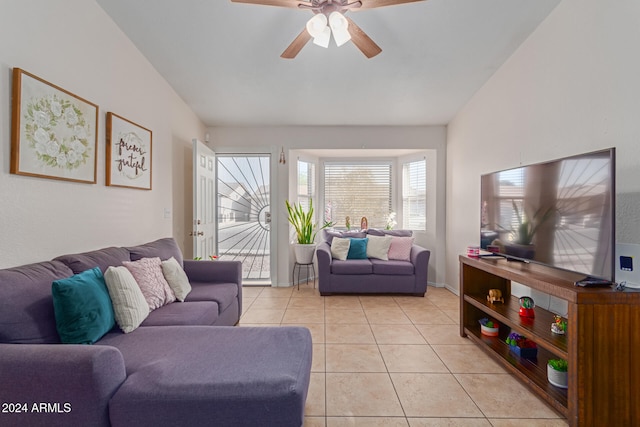 living room with ceiling fan and light tile patterned floors