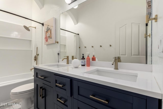 full bathroom featuring toilet, shower / bath combo with shower curtain, and double vanity