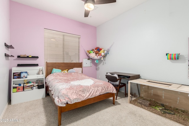 bedroom with a ceiling fan and carpet floors