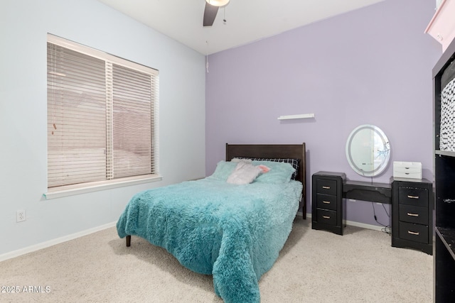 bedroom with carpet, baseboards, and ceiling fan