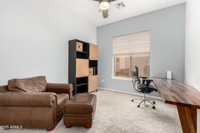 office with carpet flooring, a ceiling fan, and baseboards