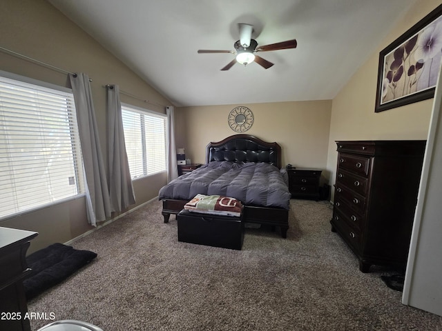 carpeted bedroom featuring ceiling fan and lofted ceiling