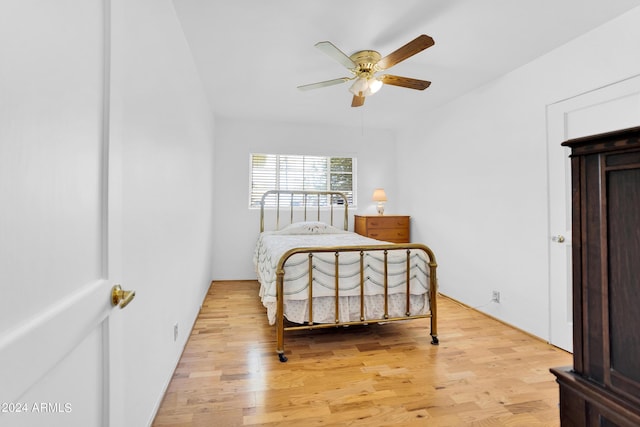 bedroom featuring ceiling fan and light hardwood / wood-style floors