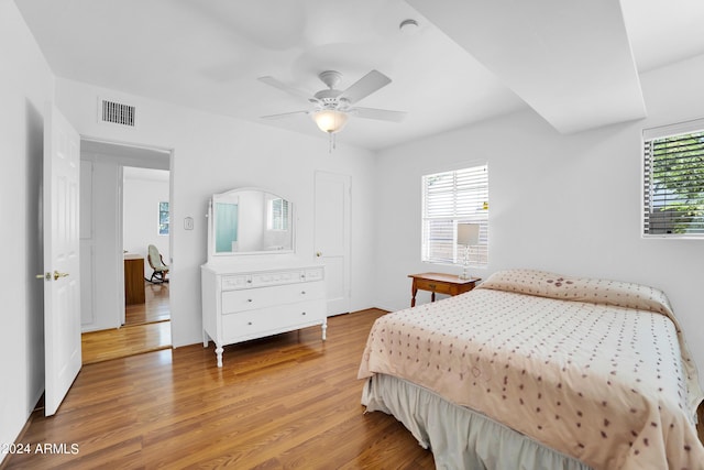 bedroom featuring ceiling fan and hardwood / wood-style flooring