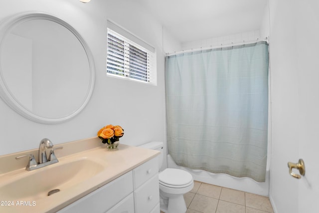 full bathroom with toilet, vanity, tile patterned flooring, and shower / bathtub combination with curtain