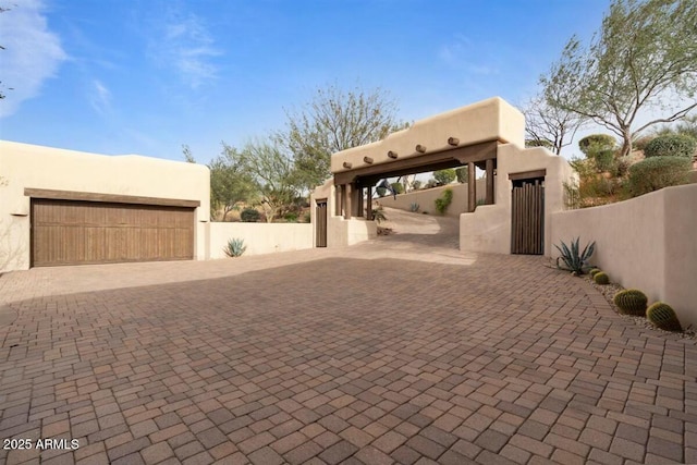 garage with fence