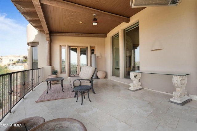 balcony featuring french doors and visible vents