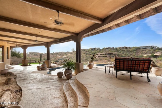 view of patio featuring a hot tub