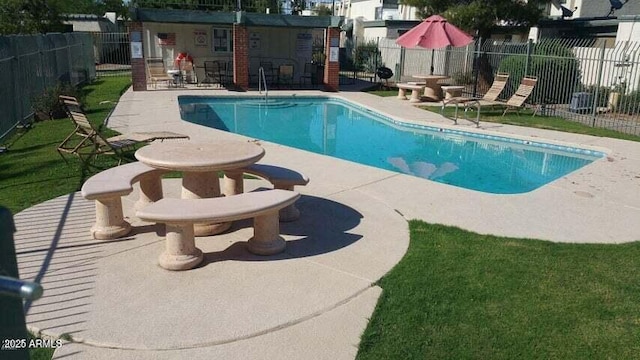 view of pool featuring a patio area