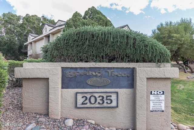 view of community sign
