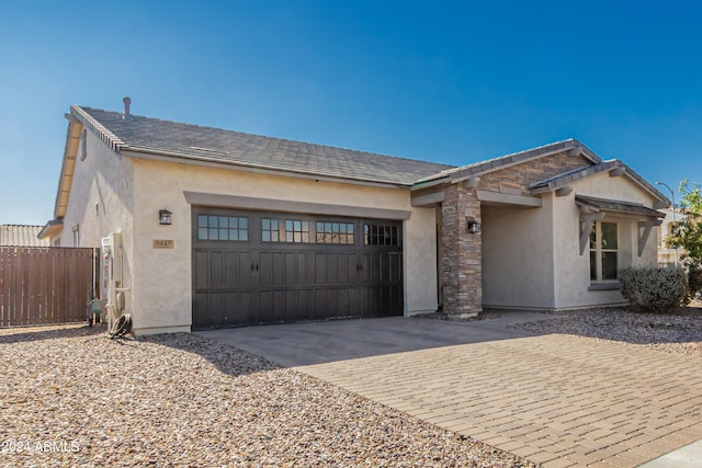 view of front of property featuring a garage