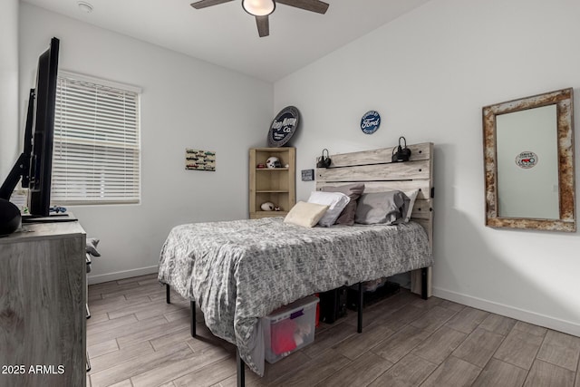 bedroom with lofted ceiling and ceiling fan