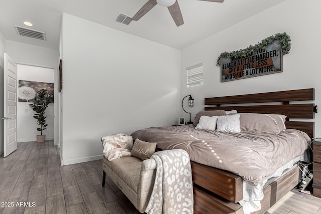 bedroom featuring ceiling fan and wood-type flooring