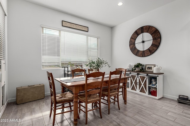 dining room with light hardwood / wood-style flooring