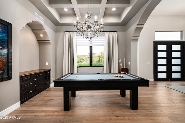 rec room featuring coffered ceiling, pool table, baseboards, light wood finished floors, and a chandelier