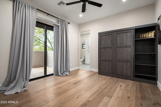 unfurnished bedroom with access to outside, light wood-type flooring, recessed lighting, baseboards, and connected bathroom