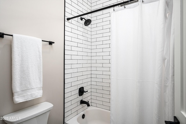 full bathroom featuring toilet and shower / bath combo with shower curtain